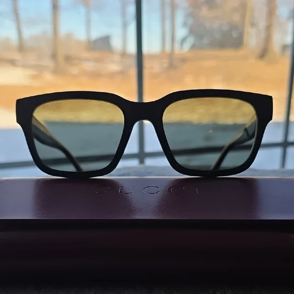 Gucci Black Sunglasses with Gold Accents